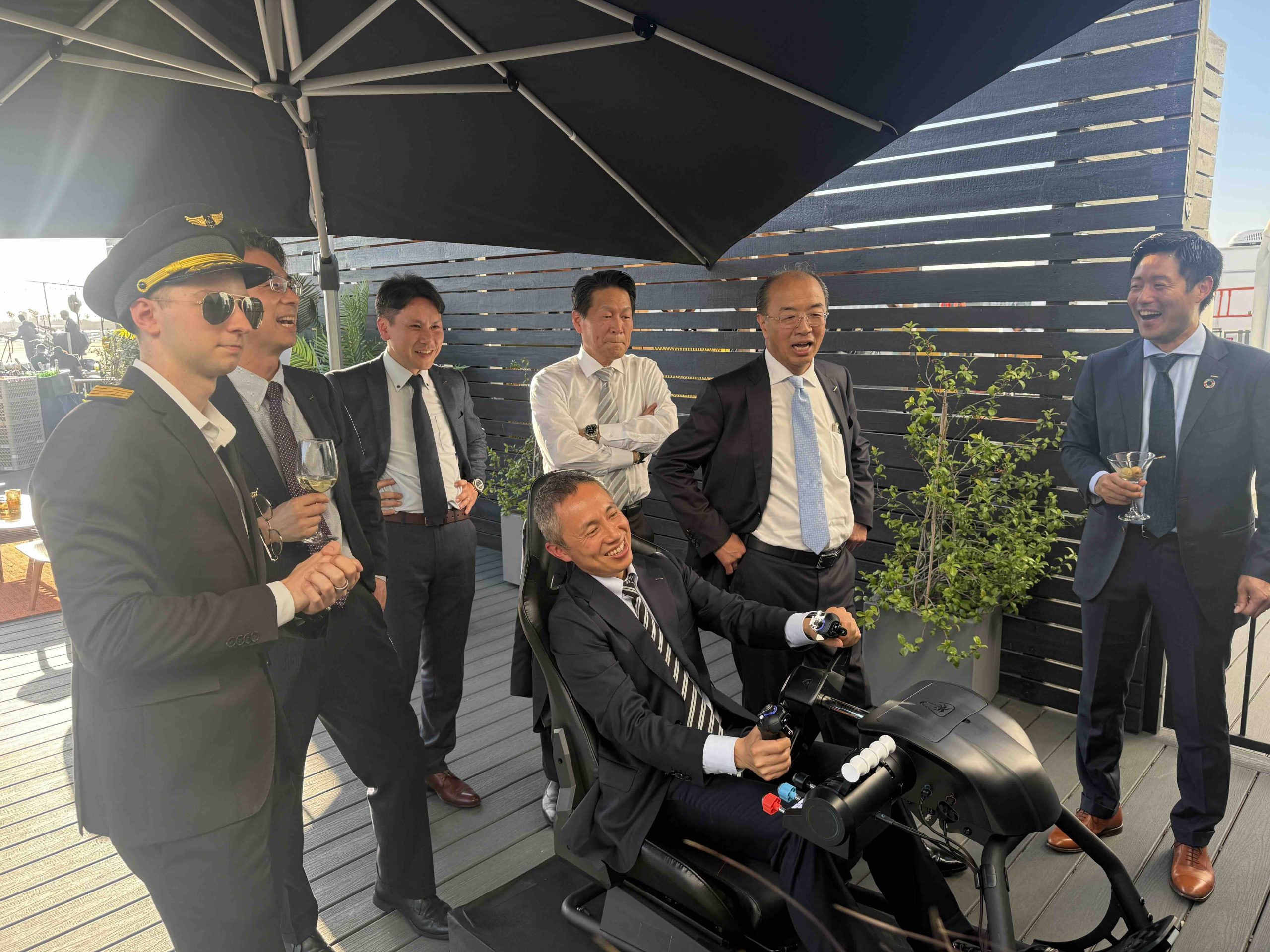 Guests trying the SIER Events flight simulator at a live event